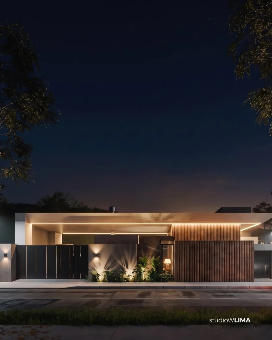 Fachada noturna da Casa Comemorar, casa térrea contemporânea com iluminação embutida, muro em ripado de madeira e portão preto